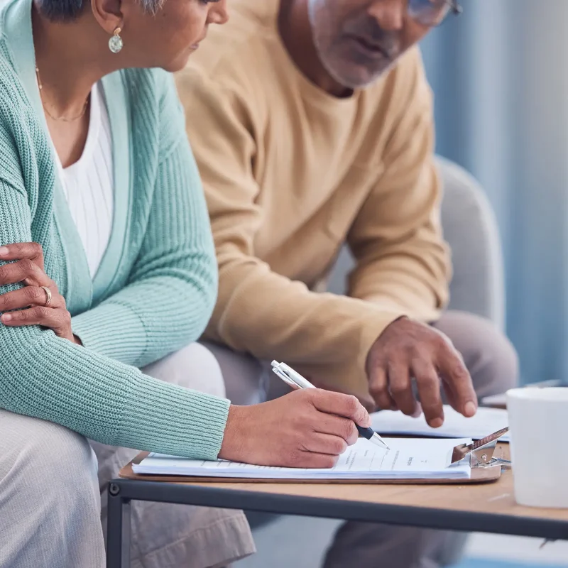 Senior couple, documents and sign contract for life insurance or home mortgage. Discussion, signatu.